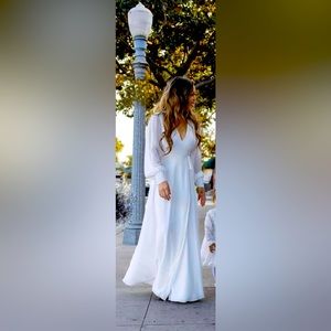 Beautiful long sleeve white maxi wrap dress.